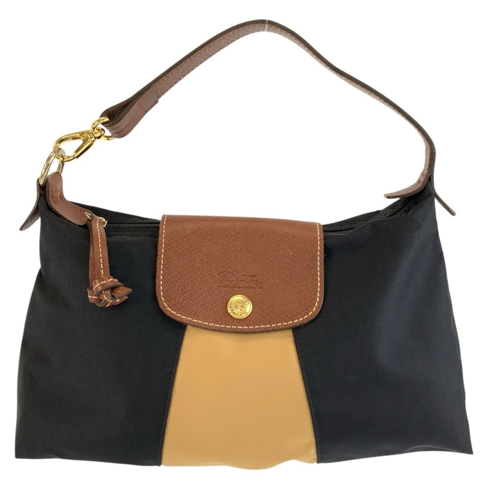 Longchamp black and brown nylon handbag with gold hardware for women.
